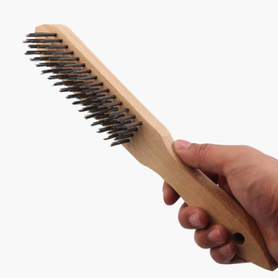Cepillo de metal con mango de madera