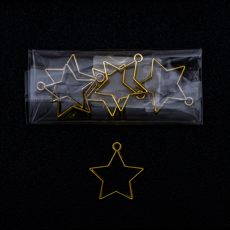 Dije estrella en dorado 5pc