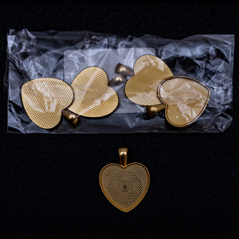 Dije de corazón en dorado 5pc