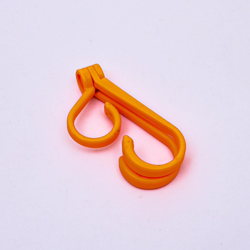 Gancho de plastico multifunción