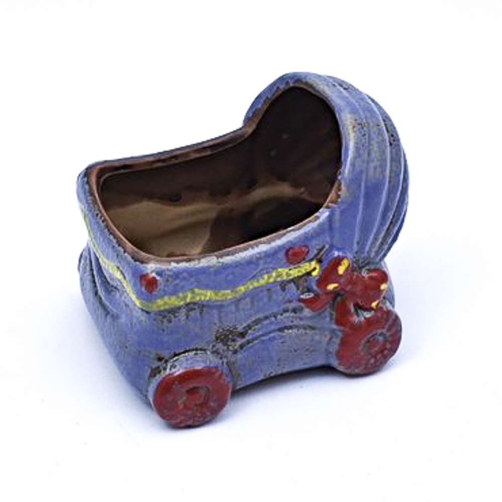 Maceta con diseño de carrito bebe