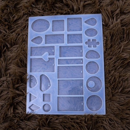 [DY028] Molde de silicona dijes con 26 diseños 210*160mm